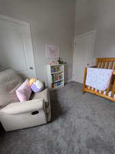 Bedroom with carpet and baseboards
