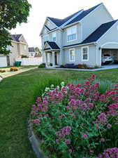 Traditional-style house featuring stucco siding