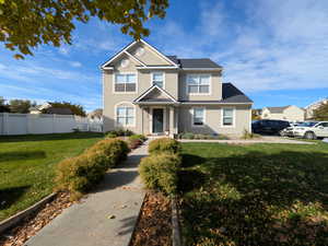 View of front of house with stucco siding