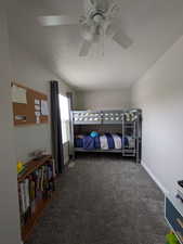 Bedroom with carpet flooring and ceiling fan