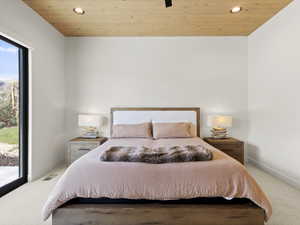 Bedroom with wooden ceiling, light carpet, access to outside, recessed lighting, and ceiling fan