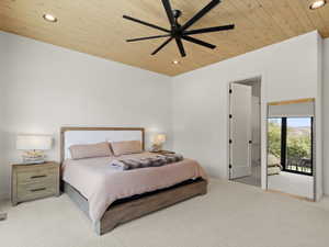 Carpeted bedroom with recessed lighting, a ceiling fan, and wooden ceiling