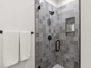 Bathroom featuring a shower stall