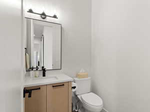 Bathroom with vanity and toilet
