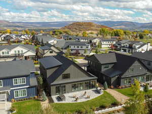 Aerial view of residential area featuring mountains
