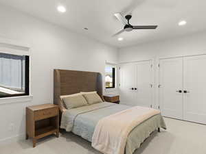 Bedroom with multiple closets, carpet floors, recessed lighting, and a ceiling fan