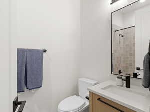 Bathroom with vanity and a shower