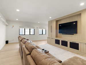 Living room featuring recessed lighting and light wood-style floors