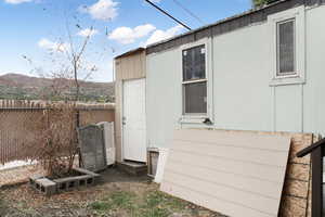 View of outbuilding featuring a mountain view