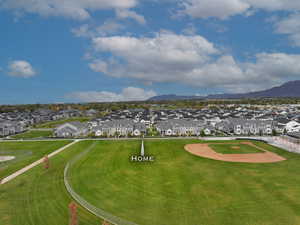 Surrounding community with a residential view and a mountain view