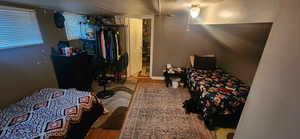 Bedroom with wood finished floors