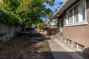 View of fenced backyard.