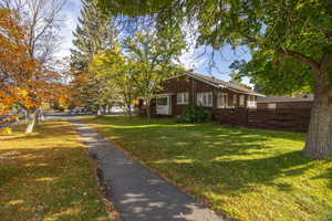 View of property exterior with corner lot.
