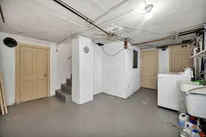 Basement laundry/storage room.