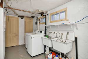 Laundry area with sink.
