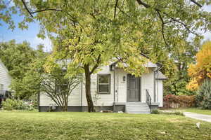 View of front of home featuring a front lawn