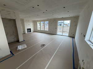 Unfurnished living room with a fireplace