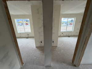 Miscellaneous room with a textured ceiling