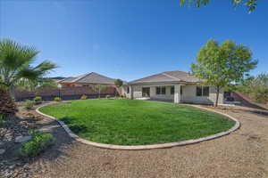 Rear view of house featuring stucco siding