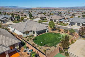 Aerial view of residential area with a mountainous background