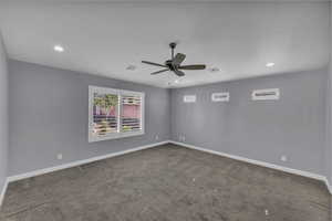 Carpeted spare room featuring recessed lighting and ceiling fan