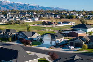 Aerial view of residential area featuring mountains