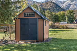 View of shed featuring a mountain view