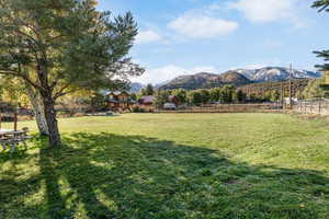 View of yard featuring a mountain view and a rural view