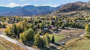 View of mountain backdrop with rural landscape