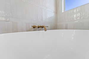 Bathroom view of a freestanding bath