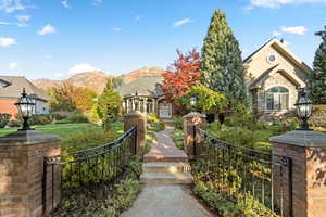 View of front facade with a mountain view and stone siding
