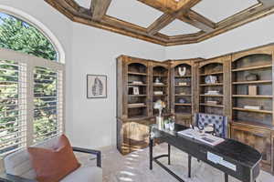 Office featuring coffered ceiling, beam ceiling, and carpet floors