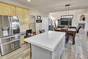 Kitchen features a built-in desk.