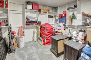 View of storage with built-in closet organizers.