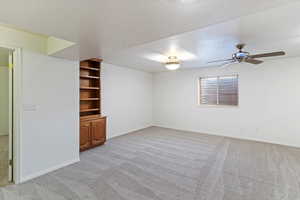 Spacious and inviting, the family room is the heart of the home—perfect for everyday living and entertaining. Featuring an open layout with abundant natural light, this warm and welcoming space offers ample room for comfortable seating, media setup, and