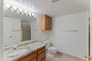 nice sized bathroom on family room level with beautiful sparkling clean shower.