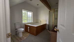 Bathroom featuring a stall shower, a garden tub, beam ceiling, and light carpet