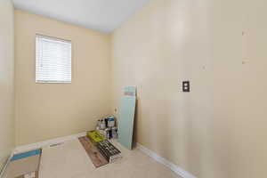 Washroom featuring baseboards