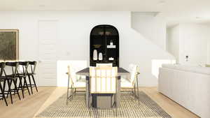 Dining room with light wood-style flooring