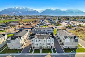 Aerial view of residential area with a mountainous background