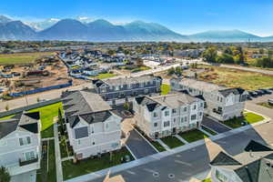 Aerial view of residential area featuring mountains