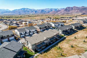Aerial perspective of suburban area featuring mountain views