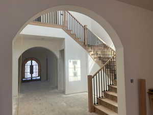 Stairs featuring arched walkways