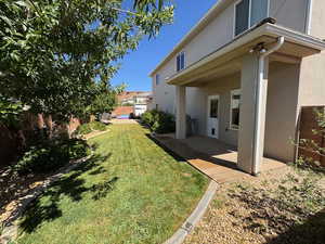 View of back yard featuring a patio