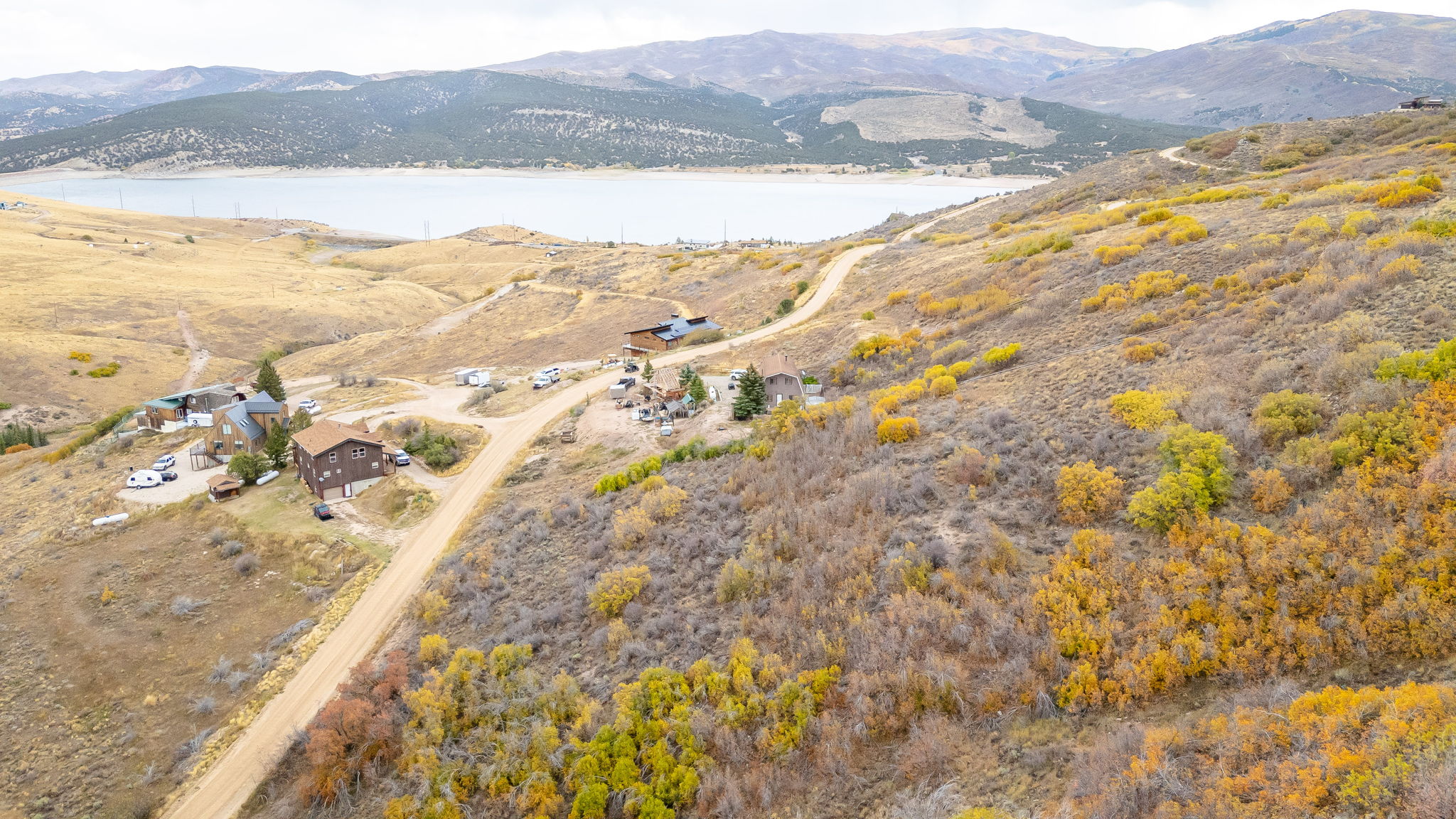 View of property location with a water and mountain view