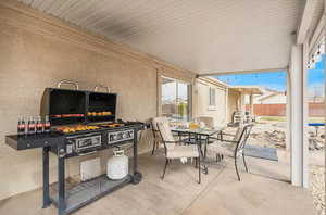 View of patio with outdoor dining space