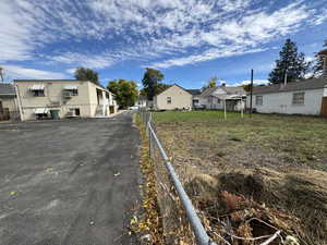 View of asphalt road with a residential view