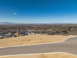 Aerial perspective of suburban area with a mountainous background