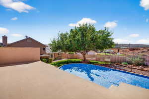 View of pool featuring a fenced backyard