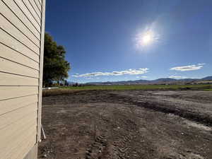 View of yard featuring a mountain view